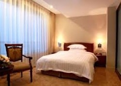 Imagen de la habitación del Hotel Dalian Greatwall. Foto 5