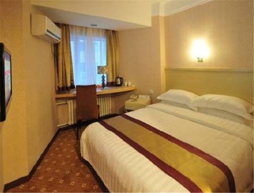 Imagen de la habitación del Hotel Dalian Jinbai International. Foto 3