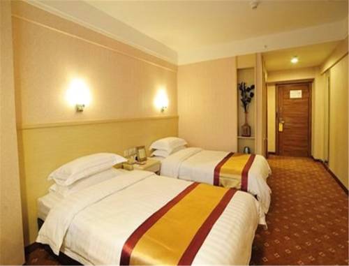 Imagen de la habitación del Hotel Dalian Jinbai International. Foto 4