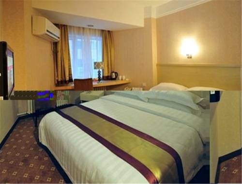 Imagen de la habitación del Hotel Dalian Jinbai International. Foto 6