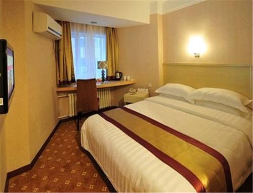Imagen de la habitación del Hotel Dalian Jinbai International. Foto 7