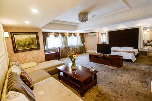 Imagen de la habitación del Hotel Dalian Jinbai International. Foto 8