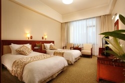 Imagen de la habitación del Hotel Dalian Kellen International Hotspring Club. Foto 4