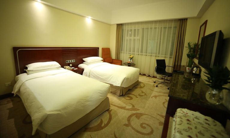 Imagen de la habitación del Hotel Dalian Kerren. Foto 6