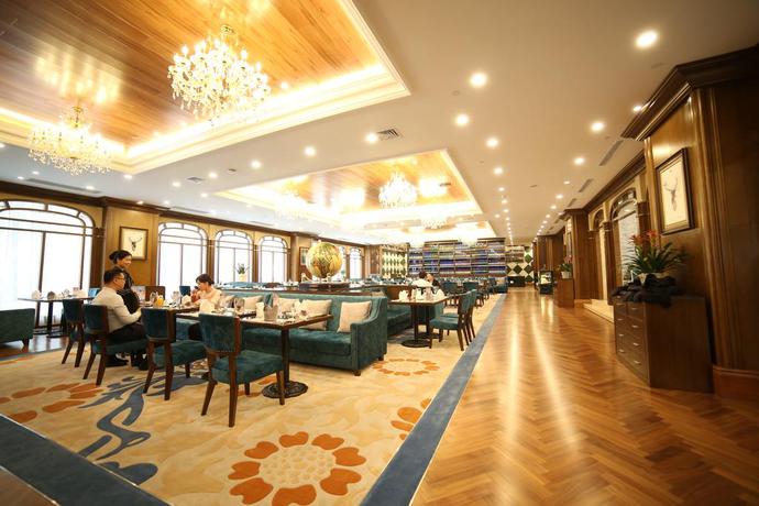 Imagen del bar/restaurante del Hotel Dalian Kerren. Foto 2