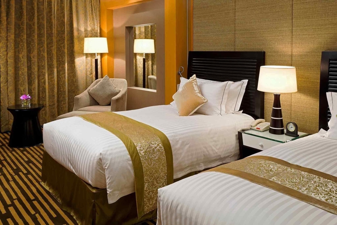 Imagen de la habitación del Hotel Dalian Mercure Teda Hotel. Foto 3