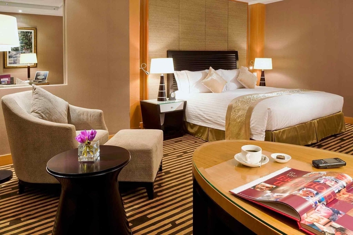 Imagen de la habitación del Hotel Dalian Mercure Teda Hotel. Foto 5