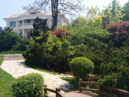 Imagen general del Hotel Dalian Nanshan Garden. Foto 6