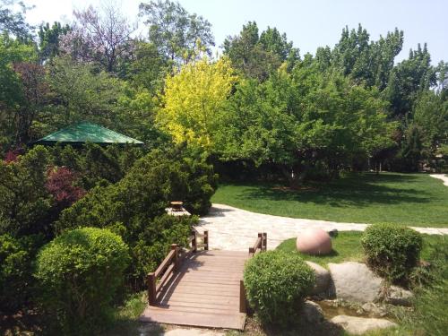 Imagen general del Hotel Dalian Nanshan Garden. Foto 7