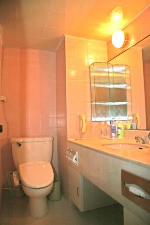 Imagen de la habitación del Hotel Dalian Royal. Foto 3