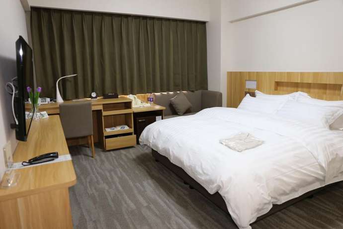 Imagen de la habitación del Hotel Dalian Royal. Foto 4