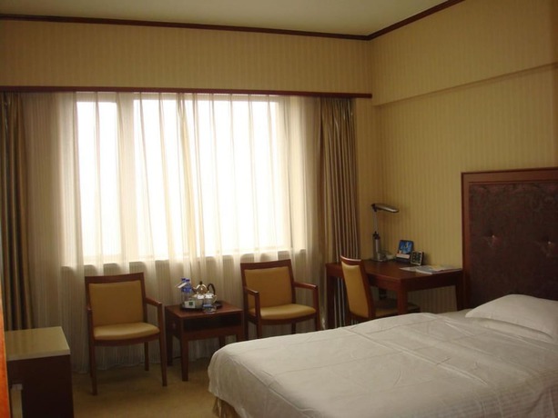 Imagen de la habitación del Hotel Dalian Royal. Foto 10