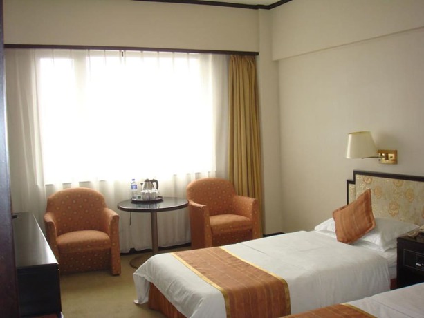 Imagen de la habitación del Hotel Dalian Royal. Foto 12