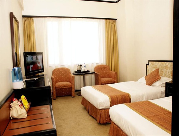 Imagen de la habitación del Hotel Dalian Royal. Foto 15
