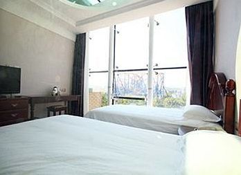 Imagen de la habitación del Hotel Dalian Royal Holiday Inn. Foto 4