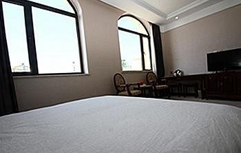 Imagen de la habitación del Hotel Dalian Royal Holiday Inn. Foto 5