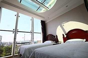 Imagen de la habitación del Hotel Dalian Royal Holiday Inn. Foto 6