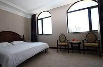 Imagen de la habitación del Hotel Dalian Royal Holiday Inn. Foto 7