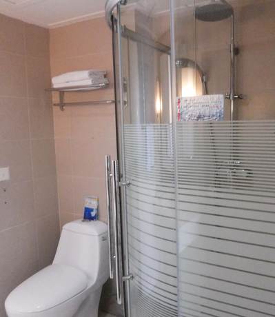 Imagen de la habitación del Hotel Dalian Sanhe. Foto 6