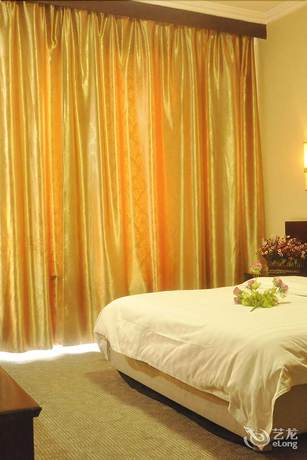 Imagen de la habitación del Hotel Dalian Sanhe. Foto 7
