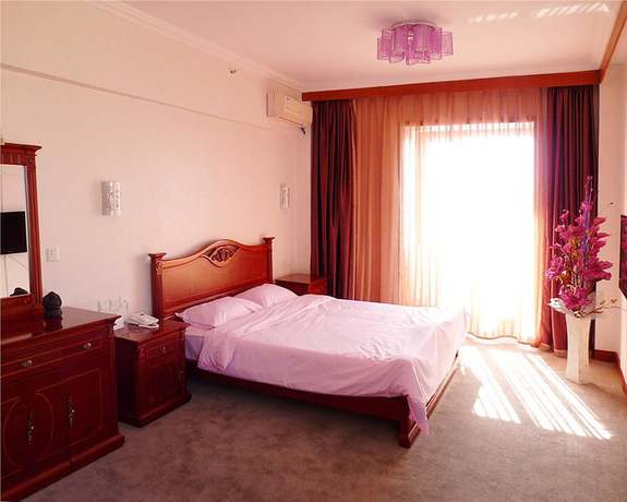 Imagen de la habitación del Hotel Dalian Sanhe. Foto 8