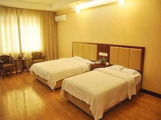 Imagen de la habitación del Hotel Dalian Sanhe. Foto 10