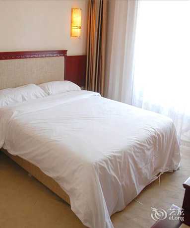 Imagen de la habitación del Hotel Dalian Sanhe. Foto 11