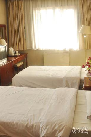 Imagen de la habitación del Hotel Dalian Sanhe. Foto 14