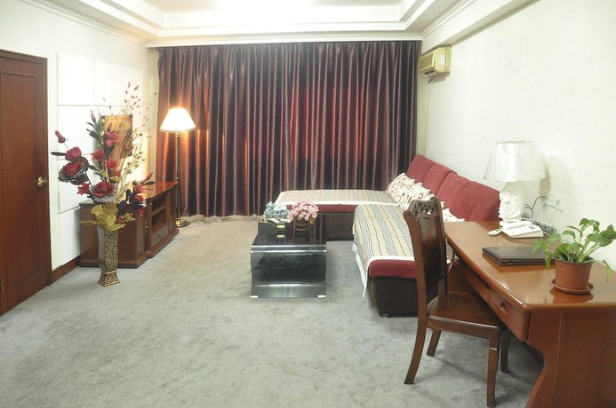 Imagen de la habitación del Hotel Dalian Sanhe. Foto 17