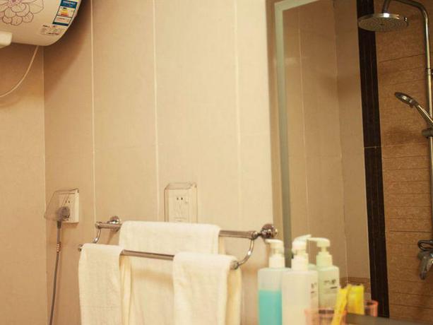 Imagen de la habitación del Hotel Dalian Shiyuan Business Apartment Hotel. Foto 6