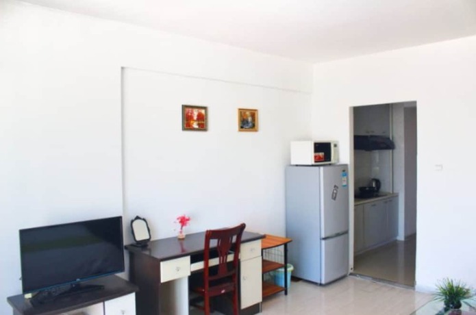 Imagen de la habitación del Hotel Dalian Tinghai Holiday Apartment. Foto 3
