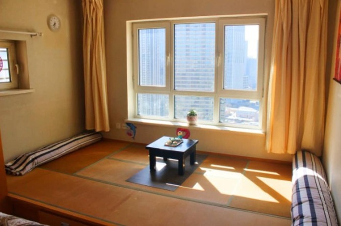 Imagen de la habitación del Hotel Dalian Tinghai Holiday Apartment. Foto 4