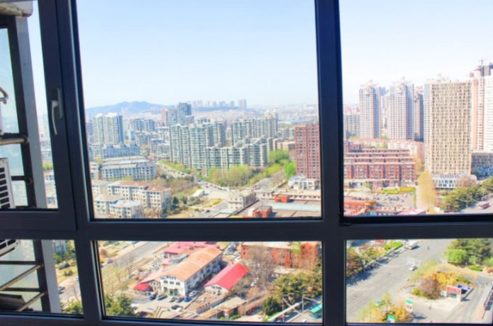 Imagen de la habitación del Hotel Dalian Tinghai Holiday Apartment. Foto 9