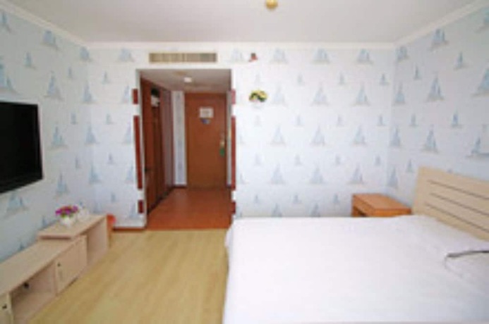 Imagen general del Hotel Dalian Venus Apartment. Foto 12