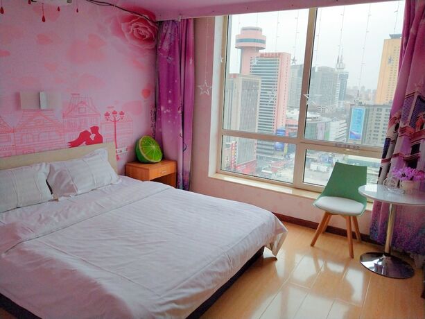 Imagen de la habitación del Hotel Dalian Venus Apartment. Foto 18