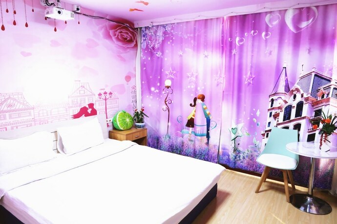Imagen de la habitación del Hotel Dalian Venus Apartment. Foto 20