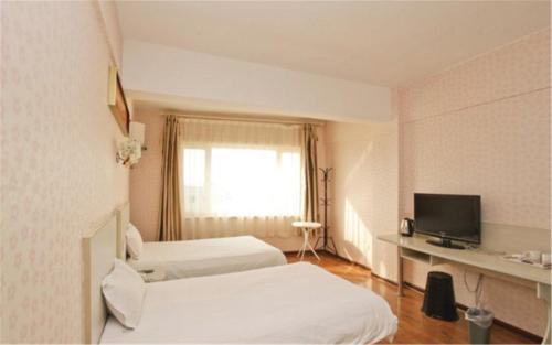 Imagen general del Hotel Dalian Weiba Inns &. Foto 5