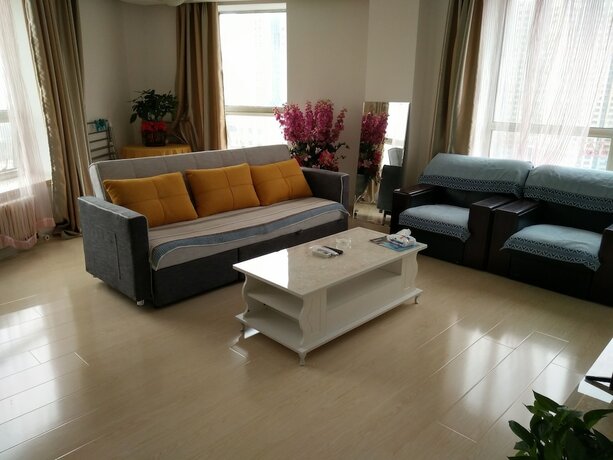 Imagen general del Hotel Dalian Xiuzhu Building Apartment. Foto 2