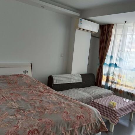 Imagen general del Hotel Dalian Xiuzhu Building Apartment. Foto 9