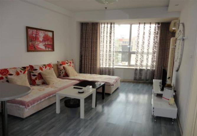 Imagen general del Hotel Dalian Xiuzhu Building Apartment. Foto 11