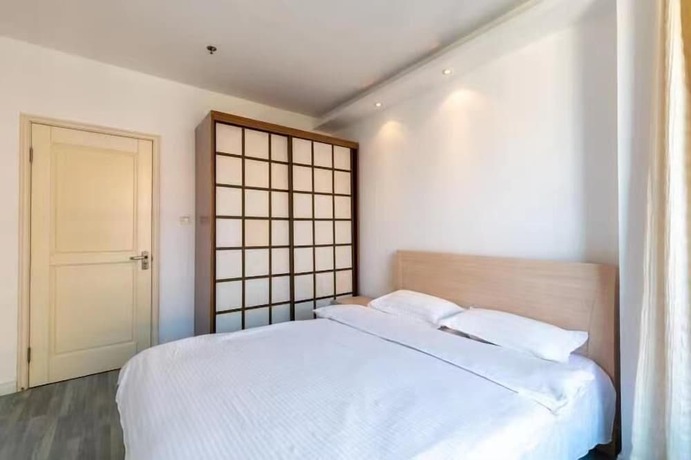Imagen general del Hotel Dalian Xiuzhu Building Apartment. Foto 15