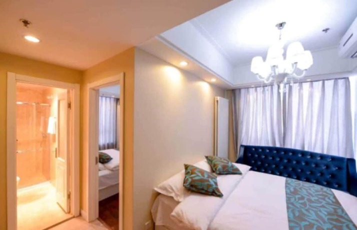 Imagen de la habitación del Hotel Dalian Yijia Apartment Sanba Square. Foto 10