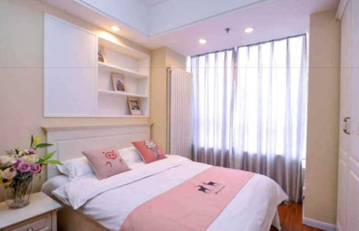 Imagen de la habitación del Hotel Dalian Yijia Apartment Sanba Square. Foto 14