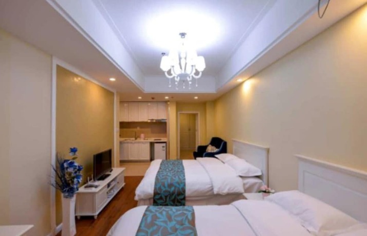 Imagen de la habitación del Hotel Dalian Yijia Apartment Sanba Square. Foto 15