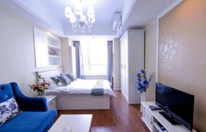 Imagen de la habitación del Hotel Dalian Yijia Apartment Sanba Square. Foto 17