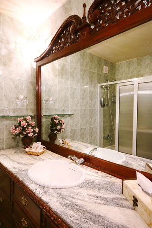 Imagen de la habitación del Hotel Dallas Residence. Foto 8