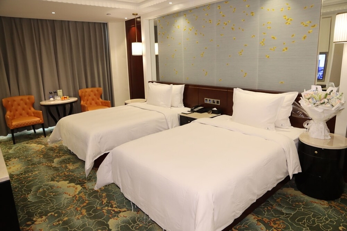 Imagen de la habitación del Hotel Dalong Century Bojun. Foto 4