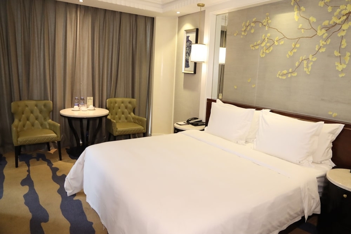Imagen de la habitación del Hotel Dalong Century Bojun. Foto 7
