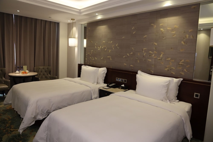 Imagen de la habitación del Hotel Dalong Century Bojun. Foto 8