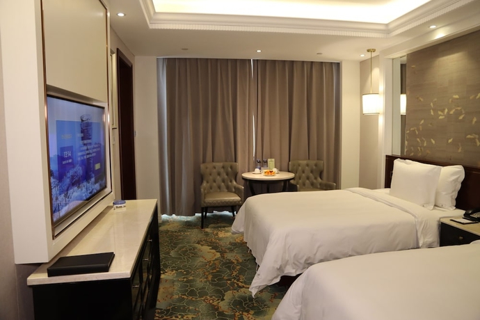 Imagen de la habitación del Hotel Dalong Century Bojun. Foto 9